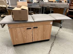 lot 74 image: Hausman Physical Therapy Massage Treatment Table with All-Purpose 2-Door Storage Cabinet - New Open Box of Barrier Paper Included - In Good Condition