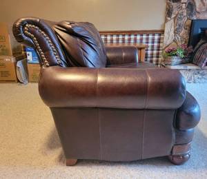 Brown leather loveseat