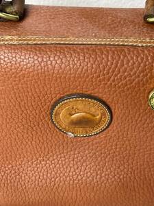 Brown Leather Dooney & Bourke Leather PurseHandbag (7 T x 9 W)