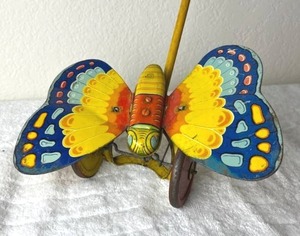 Vintage J. Chein & Co. Tin Litho Butterfly Push Toy with Wooden Handle
