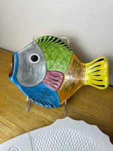 Two Colorful Ceramic Fish Plates and White Plastic Serving Plate