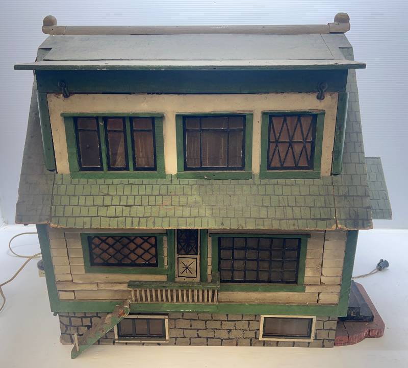 lot 88 image: Very Unique Handmade Electrified Dollhouse ( 29w x 27 12T x 24D NEEDS RESTORATION) With Handmade Wooden Dollhouse Furniture & More
