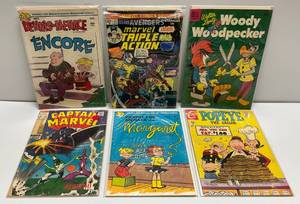 lot 4 image: Vintage 10, 12, 15, 25, 35 Cent Comics, Captain Marvel Has Cutout In Upper Left & Some Writing