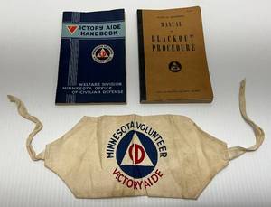 lot 29 image: U.S. Wartime Civil Defense Minnesota Volunteer Victory Aid Armband And Manuals