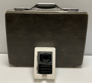 lot 115 image: Vintage Hard Sided Briefcase & Memorex Pocket Vision 29 TV