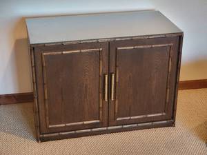 lot 69 image: Trendy Hand-Carved Accent Cabinet with Bamboo Effects