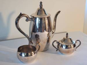 lot 130 image: Elegant Polished Silver Plate Tea Service (3)