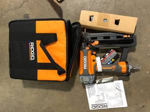 lot 12 image: RIDGID Pneumatic 16-Gauge 2-12 in. Straight Finish Nailer with CLEAN DRIVE Technology  Customer Returns See Pictures