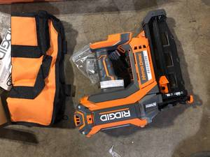 lot 37 image: RIDGID 18V Brushless Cordless HYPERDRIVE 16-Gauge 2-12 in. Straight Finish Nailer(Tool Only), Belt Clip, Bag, Sample Nails  Customer Returns See Pictures