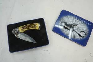 motorcycle tin with knife