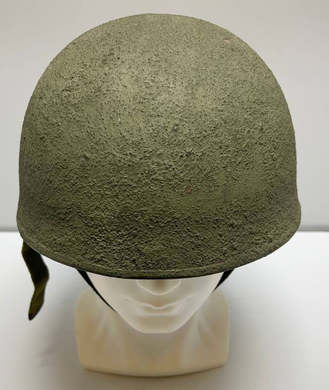 lot 14 image: Vintage WWII Textured Metal Helmet With Liner
