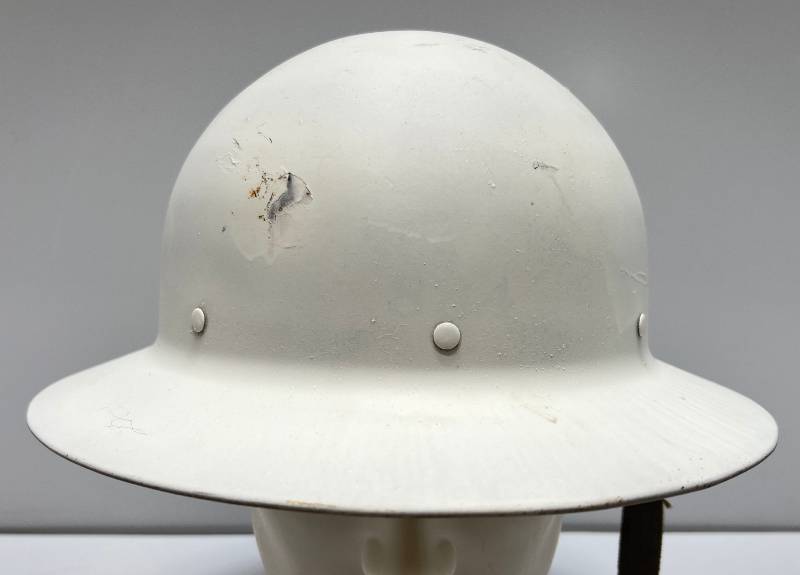 lot 52 image: WWII Era U.S. Civil Defense Hemet With Liner (Broken Strap)