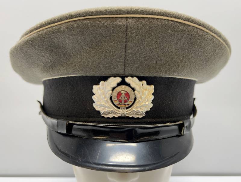 lot 101 image: Visor Hat Early Uniform Cold War Era With Officers Name Inside Size 61