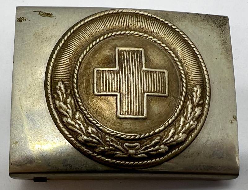 lot 182 image: WWII Red Cross Belt Buckle