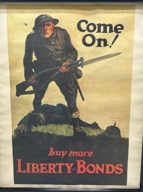 lot 206 image: Framed 1960s Walter Whitehead WWI Repro Come On Buy More Liberty Bonds Military Book CLub Poster 18 x 22 (Pinholes Present In Corners)