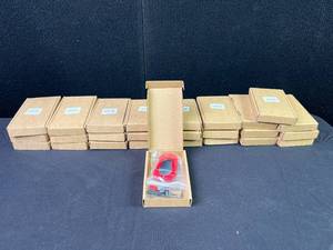 lot 1335 image: Cadillac Key Fob Cover Wristlets