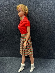 lot 303 image: Vintage Gorgeous Titan Red Swirl Ponytail Barbie Doll 1962