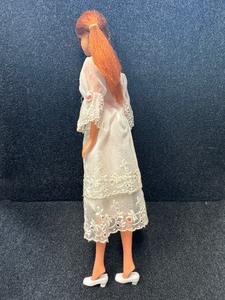 lot 325 image: Barbie Doll in Midi Marvelous Dress.