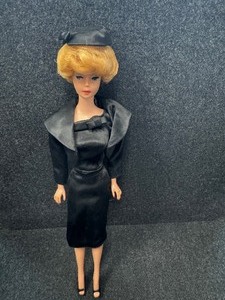lot 331 image: Vintage 1960s Barbie Bubblecut White Lips Black Cocktail Dress & Jacket.