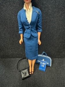 lot 333 image: Brunette Ponytail Barbie Wearing American Outfit.