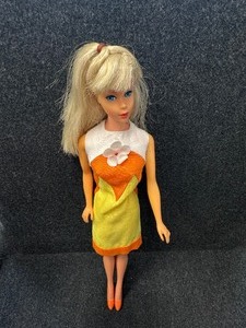 lot 335 image: Vintage Platinum Mod TNT Barbie in Tropicana Dress.