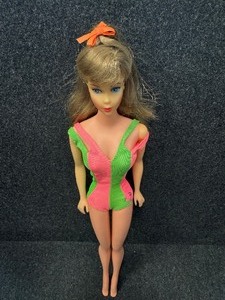 lot 338 image: Ash Blonde MOD Standard Barbie Doll in Original Swimsuit.