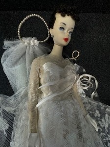 lot 339 image: Early Barbie Wearing Wedding Dress.