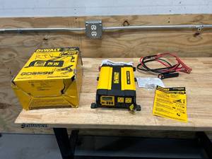 lot 73 image: DEWALT 1000-Watt Portable Car Power Inverter with Triple USB Ports