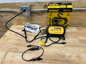 lot 75 image: DEWALT DXAEWPC4 Waterproof Battery Charger & Maintainer