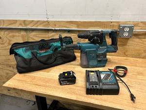 lot 91 image: MAKITA Hammer Drill with HEPA Filter, Charger, 1 Battery and Bag