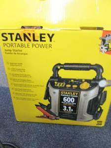 lot 11 image: Stanley 300-Amp Jump Starter open b...