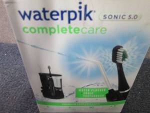 lot 94 image: Waterpik Complete Oral Care 5.0 - B...