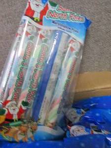 lot 300 image: 12- 1.91 oz pks Santas North Poles...