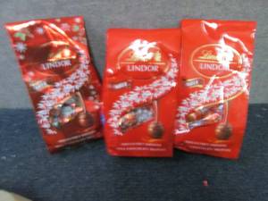 lot 359 image: 3- 8.5 Bags Lindor Milk Chocolate...
