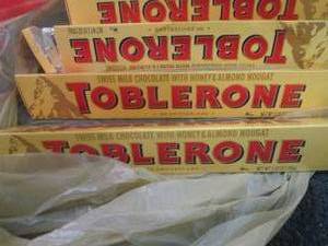 lot 379 image: 4- 3.52 Toblerone...