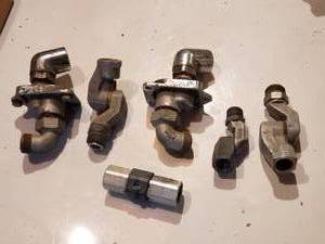 lot 28 image: 34 fuel hose swivels and break aways