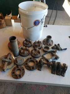 lot 59 image: bucket full of miscellaneous barrel caps and fittings
