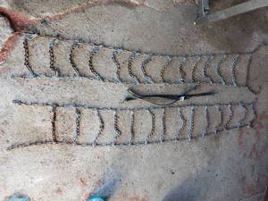 lot 77 image: tire chains and bungie cords