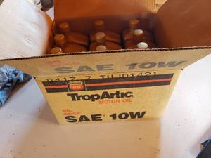 lot 92 image: case of 121 quart jugs of PHILLIPS 66 TropArtic 10w oil