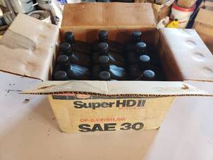 lot 94 image: case of 121 quart jugs of PHILLIPS 66 Super HD 2 SAE30 oil