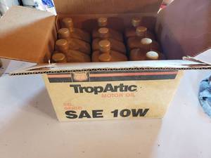 lot 95 image: case of 121 quart jugs of PHILLIPS 66 TropArtic 10w oil