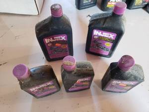 lot 98 image: 5 1quart jugs of PHILLIPS 66 injex two-cycle motor oil