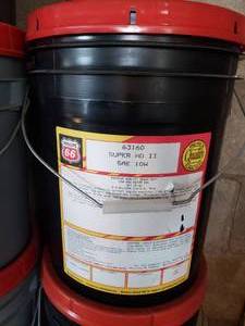 lot 106 image: new unopened 5 gal bucket of 10W super HD 2 motor oil
