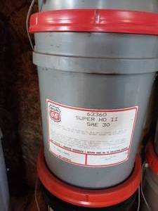 lot 110 image: new unopened 5 gal bucket of SUPER HD 2 SAE 30 motor oil