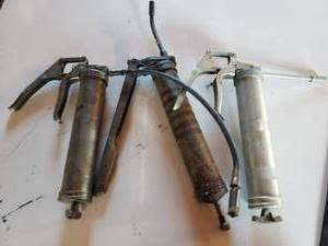 lot 116 image: lot of 3 grease guns one appears to be new