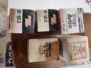 lot 174 image: misc. lot of filters (1) purOlator filter #T-7L, (1) PHILLIPOS 66 part # PP-49, (1) TROP ARTIC # PO-40, (2) BALDWIN B-163