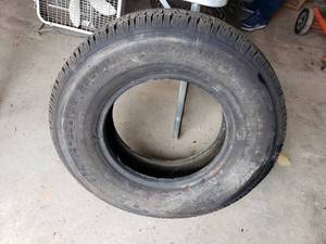 lot 244 image: NEW SEARS tire size 22575R15