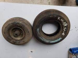 lot 249 image: (2) new small pneumatic tires tire size 4.103.50-6 and 4.103.50-4 on a rim