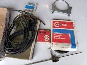 lot 277 image: lot of spark plug wires and other automotive parts