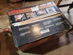 lot 298 image: NEW 10 SKILL table saw new in box with stand